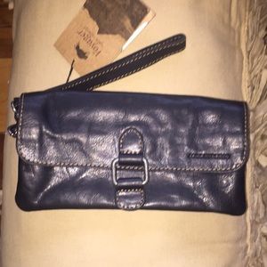 Black leather Voyager by Jack Georges wristlet